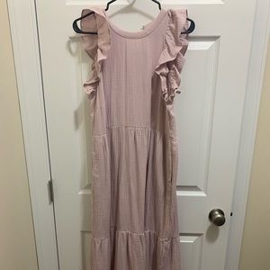 Sleeveless dress with ruffle detail